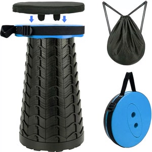 May include: A black folding stool with a blue top and a black carrying bag. The stool is made of a durable material and is perfect for camping, picnics, or other outdoor activities.