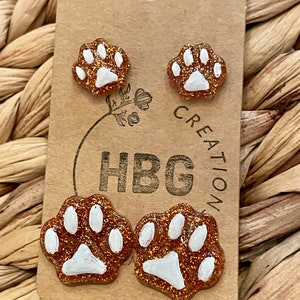 2 Pairs Glitter Paw Print Stud Earrings: Orange Resin, Hypoallergenic