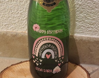 Champagne bottle personalized with desired text and motif