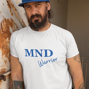 May include: White t-shirt with blue text that reads "MND Warrior".
