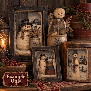 May include: A collection of rustic holiday decor featuring framed prints of snowmen in winter landscapes, a fabric snowman figurine in a stoneware crock, and a cylindrical box with a snowman print, all accented with red berries and greenery.