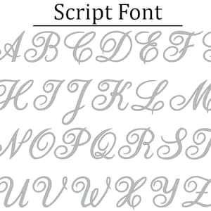 May include: A set of uppercase letters in a script font. The letters are gray and are arranged in alphabetical order.