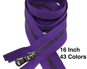 Op de afbeelding: Een 40,6 cm lange paarse rits met een zilveren metalen schuif. De ritssluiting heeft een visgraatpatroon. 16 inch 43 kleuren