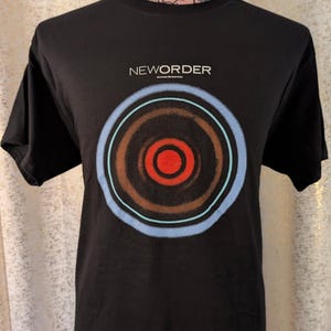 Camiseta de rock de la banda New Order Blue Monday con licencia oficial de los años 80.