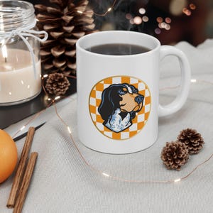 Tennessee Ceramic Mug, Smokey Dog on Orange and White Checkered Background, Gift for Volunteers Fan, UT Vols Coffee Cup, Souvenir Drinkware,
