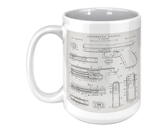 May include: White ceramic mug with a black and white illustration of a patent drawing for an automatic pistol. The patent number is 4083744 and the inventor is G. Glock. The patent was filed on August 2, 1998 and issued on May 5, 1998.