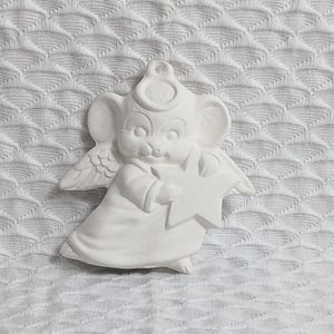 May include: White ceramic ornament of a mouse angel holding a star. The mouse has a halo and wings.