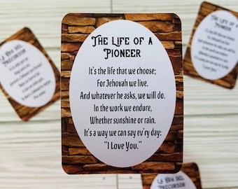 May include: A brown and white card with a brick pattern background. The card has a white circle with the text "The Life of a Pioneer" in black. The text below the circle reads "It's the life that we choose; For Jehovah we live. And whatever he asks, we will do. In the work we endure, Whether sunshine or rain. It's a way we can say ev'ry day: "I Love You."