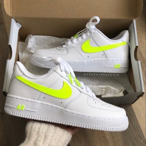 white and neon yellow air force 1