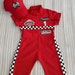 see more listings in the RACER JUMPSUIT section