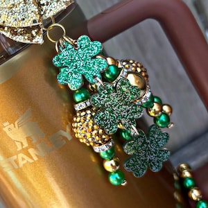 St Patrick&#39;s Day Straw Topper. Cup Accessories. Straw Charm. Dangle Charm. Single Item. Other items Pictured sold separately. Clovers.