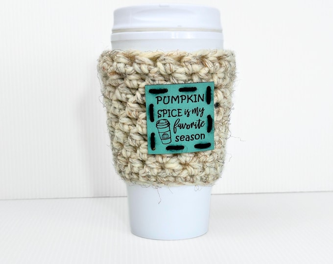 Fall Crochet Wool Travel Mug Coozy featuring a Decorative Faux Leather Patch! A must-have for Coffee Lovers and Fans of Pumpkin Spice Lattes