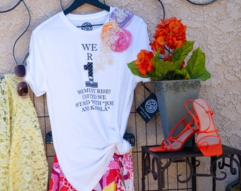 We are #1 united we stand be seen in our colorful rosettes blooms and beaded appliqued embellished statement t-shirt.