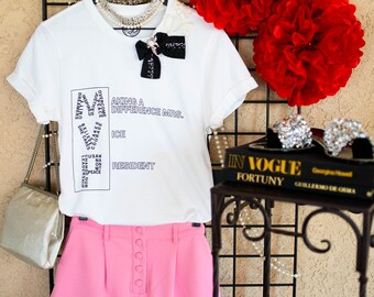Madam Vice President we believe in good things wearing our vintage inspired applique, brooch and bow embellished statement t-shirt