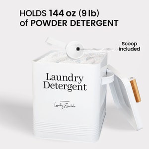 May include: White metal laundry detergent container with a scoop, holding 144 ounces (9 pounds) of powder detergent. The container has a lid with a wooden handle and the text "Laundry Detergent" and "Laundry Essentials" printed on the front.