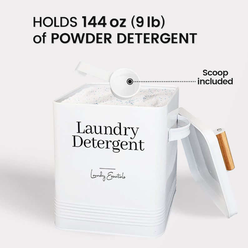 May include: White metal laundry detergent container with a scoop, holding 144 ounces (9 pounds) of powder detergent. The container has a lid with a wooden handle and the text "Laundry Detergent" and "Laundry Essentials" printed on the front.