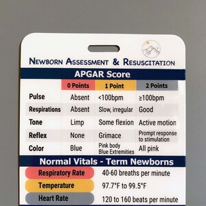 May include: A white card with blue and red text outlining the APGAR score for newborns. The card includes a table with five categories: pulse, respirations, tone, reflex, and color. Each category has three possible scores: 0, 1, and 2 points. The card also includes a section titled "Normal Vitals - Term Newborns" with information on respiratory rate, temperature, and heart rate.