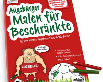 May include: A red coloring book with the title "Augsburger Malen für Beschränkte" in green lettering. The cover features a cartoon figure and a soccer ball. Two colored pencils are visible. The text indicates it's for Augsburg fans aged 18 and over.
