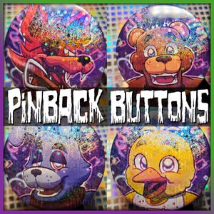 May include: Four pinback buttons with cartoon character designs. The buttons feature a red fox, a brown bear, a blue dog, and a yellow chick. The text "PINBACK BUTTONS" is displayed in white block letters across the center of the image. Each button has a glittery background.