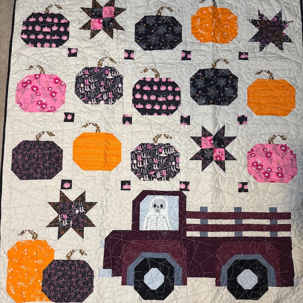 Hamdmade Halloween quilt. Made with primarily AGF fabrics.
