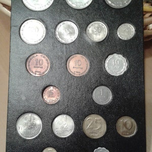 Set of prutah coins including 500 and 250 silver coins -plastic packing