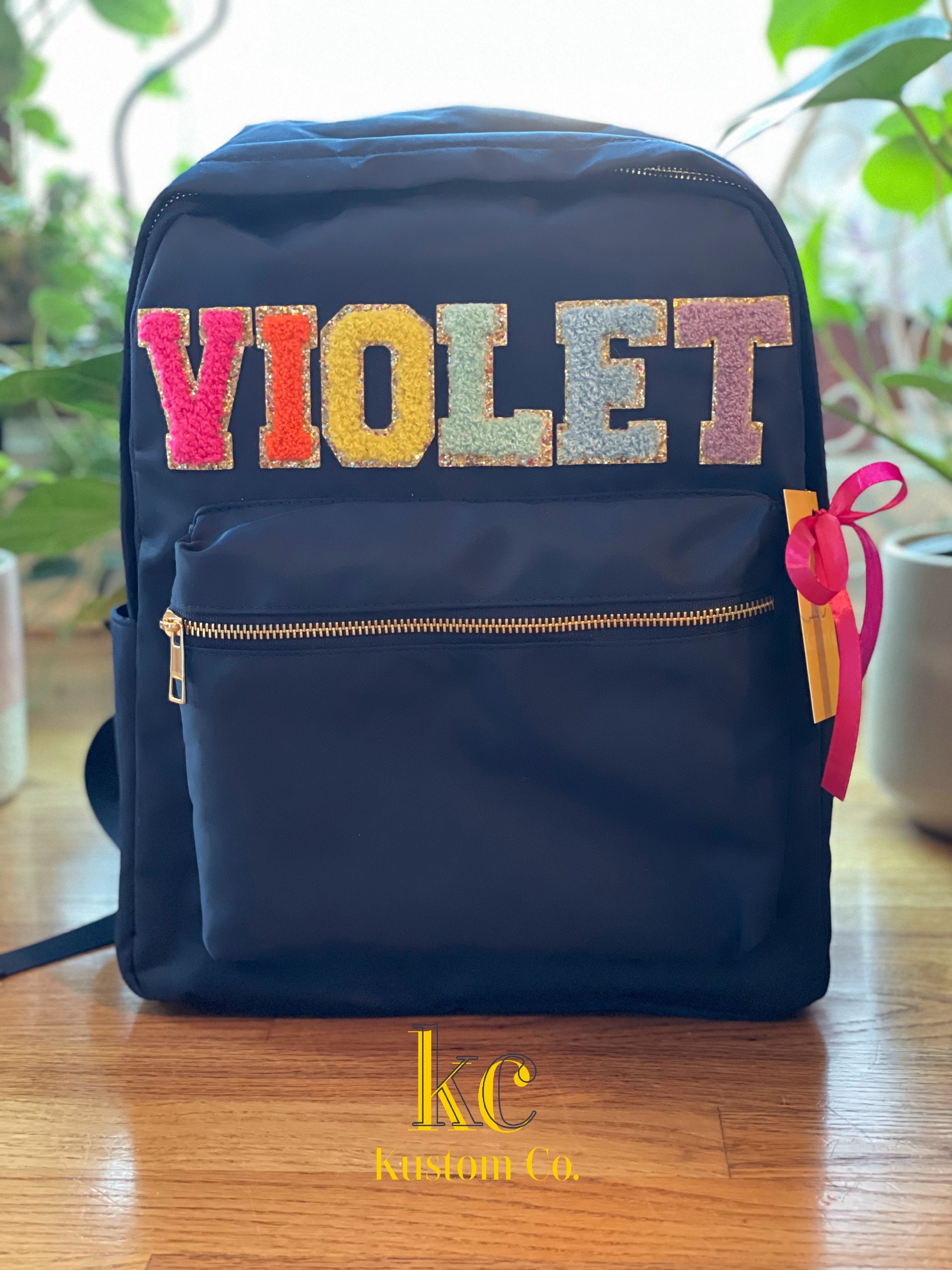 varsity glitter backpack
