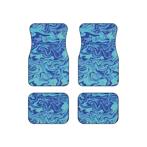 May include: Set of four car floor mats with a blue and teal swirled pattern. The set includes two front mats and two rear mats. The mats have a durable construction and are designed to protect the vehicle's interior.