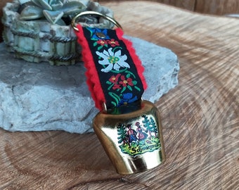 Vintage decorative fake cowbell on ribbon, souvenir from Schwartzwald