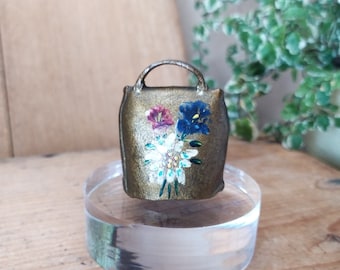 Vintage handmade bell, small metal alpine cowbell with painted flowers, souvenir from Slovenia