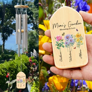 May include: A wooden wind chime with a personalized plaque that reads "Mimi's Garden Blooming in Love". The plaque features a floral design with three flowers and the names "Jackson", "Valentina", and "Athena" written below each flower.