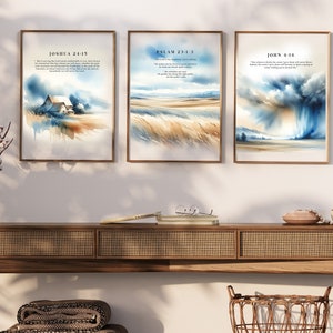 May include: Three watercolour paintings with bible verses printed on them. The first painting depicts a farmhouse in a field, the second painting depicts a field of tall grass, and the third painting depicts a stormy sky with a rainbow.