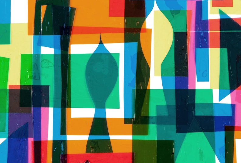 May include: Abstract art print featuring overlapping geometric shapes in various colors, including green, blue, orange, red, and yellow. The shapes are layered to create a sense of depth and dimension.