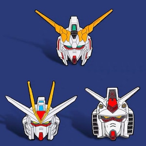 May include: Four enamel pins featuring the heads of different robots from the anime series Gundam. The pins are white, red, and yellow with black outlines.