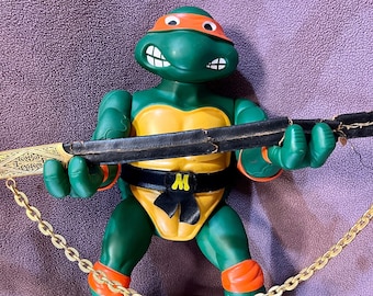 Figura de acción vintage de Michelangelo de las Tortugas Ninja de 1989 (13 pulgadas)