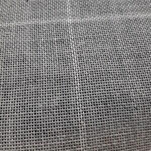 May include: Close-up of a gray woven fabric with a fine, even texture. The fabric has a subtle sheen and appears to be made of natural fibers.