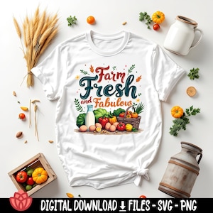 May include: White t-shirt with the text "Farm Fresh and Fabulous" in a colorful design. The shirt features a basket of vegetables, eggs, and a bottle of milk. The image includes wheat, tomatoes, and pumpkins.