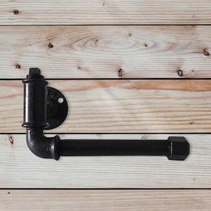 Industrial style cast iron toilet paper holder