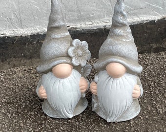 A lovely pair of grey garden gonk gnomes