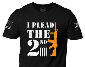 May include: Black t-shirt with a white and orange graphic that says "I Plead The 2nd" with an image of a rifle and an American flag.