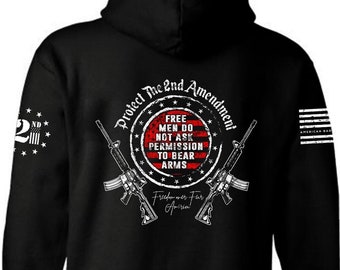 May include: Black hooded sweatshirt with a white graphic print of two crossed rifles and a red, white, and blue circle with the text "Protect The 2nd Amendment!" and "Free Men Do Not Ask Permission To Bear Arms".