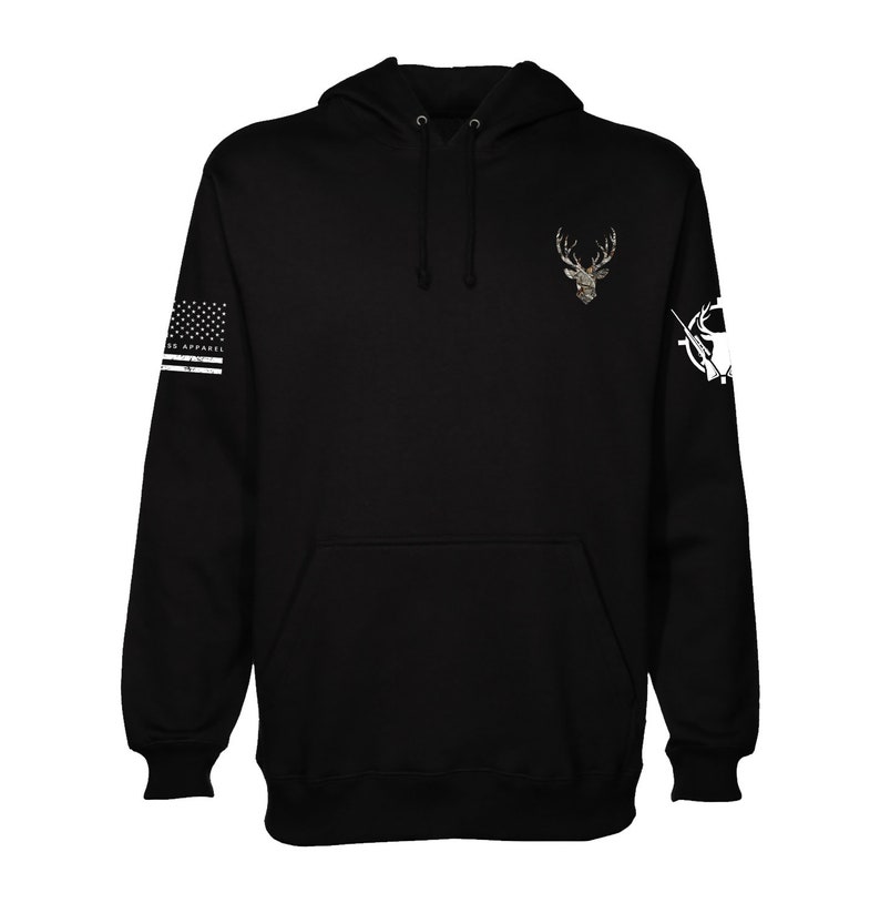 May include: Black hooded sweatshirt with a camouflage deer graphic on the front and a white American flag and a white hunting rifle graphic on the sleeves.