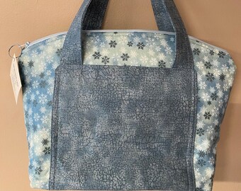 Monedero suave con copos de nieve