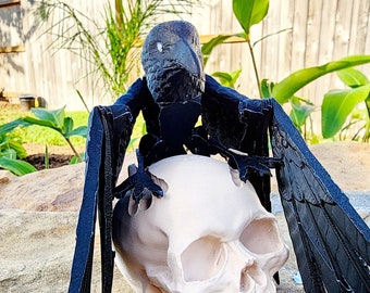 3D printed articulated Raven with articulated wings, fidget, sensory toy with optional skull base.