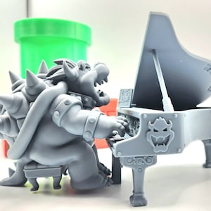8k resin printed Bowser playing piano featuring peach. DESKTOP Decoration, toy.