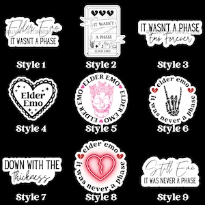 May include: Nine different sticker designs with various emo-themed phrases and graphics. The designs include a heart with the text "Elder Emo", a skull with a flower crown, a broken heart, and a hand with a skeleton hand making a rock and roll sign. The text on the stickers includes phrases like "It wasn't a phase", "Elder Emo", "Down with the thickness", and "Still Emo".