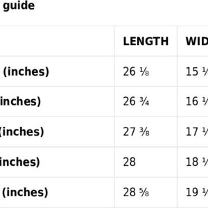 May include: A white size guide chart with measurements for clothing. The chart lists sizes XS to XL, with corresponding length and width measurements in inches. The XS size is 26 1/8 inches long and 15 1/4 inches wide.