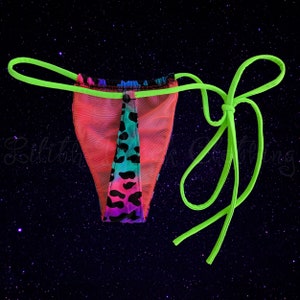 May include: A neon pink, blue, and green patterned mesh bikini bottom with a lime green string tie.