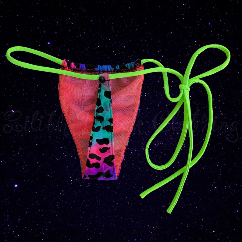 May include: A neon pink, blue, and green patterned mesh bikini bottom with a lime green string tie.