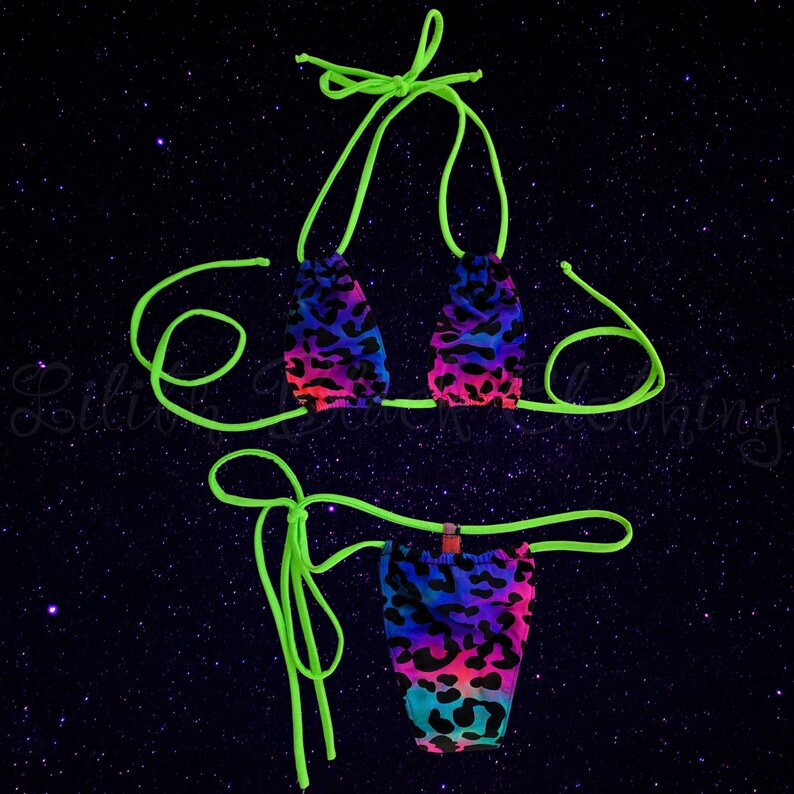 May include: A neon green bikini with a leopard print pattern in shades of pink, blue, and black. The bikini top is a triangle style with adjustable straps. The bikini bottom is a cheeky style with a high leg cut.