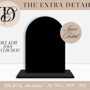 Puede incluir: Un expositor negro en forma de arco con una base rectangular. El texto "THE EXTRA DETAIL" está en la parte superior. Las palabras "FREE KERF TOOL INCLDUDED!" están a la izquierda y "Laser Tested" a la derecha. La parte inferior dice "DIGITAL download AI SVG PDF DXF".